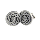Pair of silver Celtic knot cufflinks on a white background