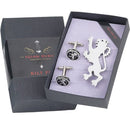 Cufflinks and a tie clip in a branded box on a white background