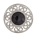 Close-up of Stroma Brooch, highlighting the detailed craftsmanship and elegant design with a colorful gemstone.