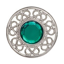 Stroma Brooch displayed against a neutral background, emphasizing its unique pewter texture and artistic flair.