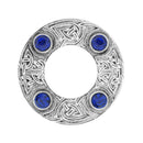 Lifestyle image of Dancers Celtic Plaid Brooch worn on clothing, illustrating its charm as a conversation starter.