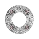 Close-up image of Dancers Celtic Plaid Brooch highlighting the striking colored stone in the center.