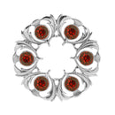 Dancers Thistle Plaid Brooch featuring intricate detailing and a beautiful colored stone, perfect for adding charm to any outfit.