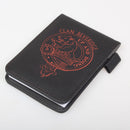 Beveridge Clan Crest Engraved Leather Small Notebook resting on a wooden table, showcasing its durable leather exterior and elegant laser-engraved design.