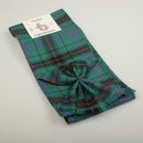 Wool Mini Sash in Davidson Ancient Tartan, a stylish accessory made of 100% pure new wool, draped elegantly over a shoulder, perfect for adding a touch of tartan to your outfit.