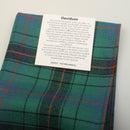 Close-up view of the Wool Mini Sash in Davidson Ancient Tartan, showcasing its vibrant colors and texture, ideal for both casual and formal occasions.