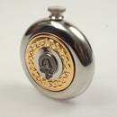 Close-up of MacNeil Clan Crest Pewter Sporran Flask with gold plated thistle design and personalized clan crest.