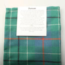 Close-up of Wool Tartan Pocket Square in Duncan Ancient Tartan texture, highlighting the luxurious feel of 100% pure new wool.