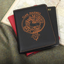 Blue notebook with Clan Maxwell Reviresco emblem on a textured surface