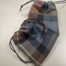 Close-up view of Tartan Gift Bags showcasing various tartan patterns, ideal for personalized wedding favors or special occasions.