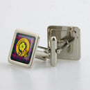 Cairns Clan Crest Cufflinks displayed in a luxurious presentation box, showcasing Scottish heritage with a vibrant clan emblem.