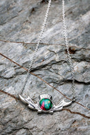 Heathergems Thistle Necklace displayed on a white background, showcasing the unique handcrafted design and vibrant colors of the Scottish Heathergems.