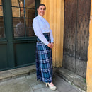 Model wearing the Ladies Floor Length Hand Stitched Kilt - mediumweight, highlighting its elegant style and fit.