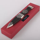 Young Clan Crest Sgian Dubh - Stone Top showcasing intricate thistle metalwork and a gold foil backed stone.