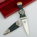 MacDonald Clan Crest Sgian Dubh - Stone Top showcasing intricate craftsmanship and a stunning multi-faceted stone.
