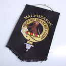 MacPherson Clan Crest Embroidered Pennant displayed on a wall, showcasing Scottish heritage and clan pride, perfect for home or office decor.