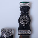 Elegant presentation of the Kincaid Clan Crest Sgian Dubh, featuring a gold foil backed stone top and beautiful pewter plating, ideal for collectors and clan pride.