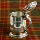 Pewter Tankard With Gold Trim and MacNicol Clan Crest, showcasing the detailed gold plated thistle design around the clan crest.