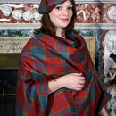 Morrison Green Ancient Lightweight Wool Serape showcasing its premium Lochcarron's Reiver fabric, perfect for adding a touch of elegance and comfort to your outfit.