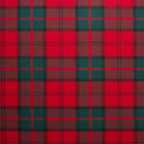 A man wearing a Springweight Wool Tartan Tie - Tartans C-F, exemplifying elegance and comfort in fashion.