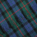 Gunn Tartan Throw Rug in soft wool blend, perfect for cozy winter nights. Stylish tartan pattern.