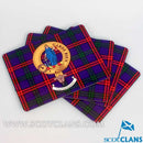 Montgomery Clan Crest and Tartan Place Mats - Set of Four showcasing Scottish heritage, featuring elegant tartan patterns and durable wooden design, perfect for dinner parties.