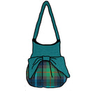Stylish New York Effie Bag made of 100% Wool Melton, showcasing its elegant design, customizable bow, and spacious interior with pockets.