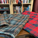 Close-up of the Robertson Red Modern Heavyweight Hand Stitched Kilt, highlighting the hand-stitched details and tartan fabric.